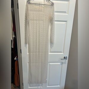 Beautiful sheer dress overlay. Pearls and rhinestones. Perfect to elevate.